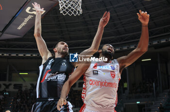 2023-10-08 - Andriu Tomas Woldetensae (Openjobmetis Varese) in action thwarted by Ognjen Dobric (Segafredo Virtus Bologna) during the LBA italian A1 series basketball championship match Segafredo Virtus Bologna Vs. Openjobmetis Varese - Bologna, Italy, October 2023 at Paladozza sports palace - Photo: Michele Nucci - VIRTUS SEGAFREDO BOLOGNA VS OPENJOBMETIS VARESE - ITALIAN SERIE A - BASKETBALL