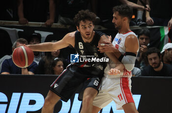 2023-10-08 - Alessandro Pajola (Segafredo Virtus Bologna) in action thwarted by Davide Moretti (Openjobmetis Varese) during the LBA italian A1 series basketball championship match Segafredo Virtus Bologna Vs. Openjobmetis Varese - Bologna, Italy, October 2023 at Paladozza sports palace - Photo: Michele Nucci - VIRTUS SEGAFREDO BOLOGNA VS OPENJOBMETIS VARESE - ITALIAN SERIE A - BASKETBALL