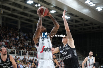 2023-10-15 - Jordan Mickey of Virtus Segafredo Bologna contrasted by Andrejs Grazulis of Dolomiti Trentino Energia during the match between Dolomiti Trentino Energia and Virtus Segafredo Bologna, regular season of A1 Italian Basketball Championship 2023/2024 at il T Quotidiano Arena on October 15, 2023, Trento, Italy. - DOLOMITI ENERGIA TRENTINO VS VIRTUS SEGAFREDO BOLOGNA - ITALIAN SERIE A - BASKETBALL