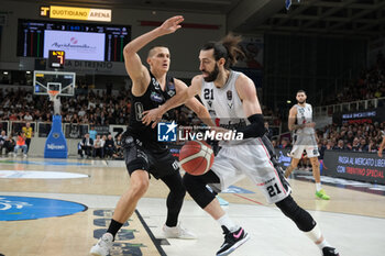 2023-10-15 - Tornik Shengelia of Virtus Segafredo Bologna contrasted by Andrejs Grazulis of Dolomiti Trentino Energia during the match between Dolomiti Trentino Energia and Virtus Segafredo Bologna, regular season of A1 Italian Basketball Championship 2023/2024 at il T Quotidiano Arena on October 15, 2023, Trento, Italy. - DOLOMITI ENERGIA TRENTINO VS VIRTUS SEGAFREDO BOLOGNA - ITALIAN SERIE A - BASKETBALL