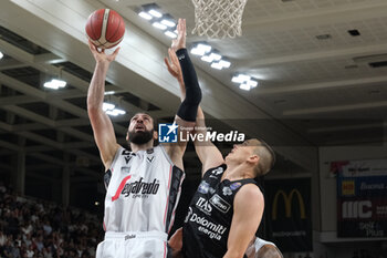 2023-10-15 - Tornik Shengelia of Virtus Segafredo Bologna and Andrejs Grazulis of Dolomiti Trentino Energia in action during the match between Dolomiti Trentino Energia and Virtus Segafredo Bologna, regular season of A1 Italian Basketball Championship 2023/2024 at il T Quotidiano Arena on October 15, 2023, Trento, Italy. - DOLOMITI ENERGIA TRENTINO VS VIRTUS SEGAFREDO BOLOGNA - ITALIAN SERIE A - BASKETBALL