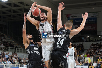2023-10-15 - Duel under the basket between Isaia Cordinier of Virtus Segafredo Bologna and Prentiss Hubb of Dolomiti Trentino Energia during the match between Dolomiti Trentino Energia and Virtus Segafredo Bologna, regular season of A1 Italian Basketball Championship 2023/2024 at il T Quotidiano Arena on October 15, 2023, Trento, Italy. - DOLOMITI ENERGIA TRENTINO VS VIRTUS SEGAFREDO BOLOGNA - ITALIAN SERIE A - BASKETBALL