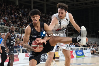 2023-10-15 - Duel for the ball between Quinn Ellis of Dolomiti Trentino Energia and Alessandro Pajola of Virtus Segafredo Bologna during the match between Dolomiti Trentino Energia and Virtus Segafredo Bologna, regular season of A1 Italian Basketball Championship 2023/2024 at il T Quotidiano Arena on October 15, 2023, Trento, Italy. - DOLOMITI ENERGIA TRENTINO VS VIRTUS SEGAFREDO BOLOGNA - ITALIAN SERIE A - BASKETBALL
