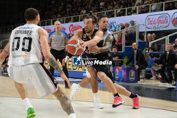 2023-10-15 - Toto Forray of Dolomiti Trentino Energia afterwards by Daniel Hackett of Virtus Segafredo Bologna during the match between Dolomiti Trentino Energia and Virtus Segafredo Bologna, regular season of A1 Italian Basketball Championship 2023/2024 at il T Quotidiano Arena on October 15, 2023, Trento, Italy. - DOLOMITI ENERGIA TRENTINO VS VIRTUS SEGAFREDO BOLOGNA - ITALIAN SERIE A - BASKETBALL