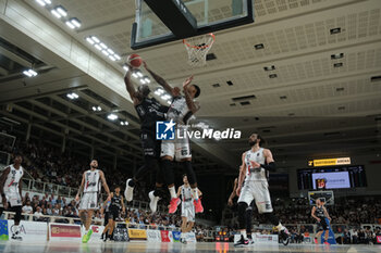 2023-10-15 - Derek Cooke Jr of Dolomiti Trentino Energia contrasted by Jordan Mickey of Virtus Segafredo Bologna during the match between Dolomiti Trentino Energia and Virtus Segafredo Bologna, regular season of A1 Italian Basketball Championship 2023/2024 at il T Quotidiano Arena on October 15, 2023, Trento, Italy. - DOLOMITI ENERGIA TRENTINO VS VIRTUS SEGAFREDO BOLOGNA - ITALIAN SERIE A - BASKETBALL