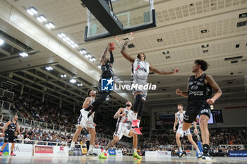 2023-10-15 - Dunk of Derek Cooke Jr of Dolomiti Trentino Energia during the match between Dolomiti Trentino Energia and Virtus Segafredo Bologna, regular season of A1 Italian Basketball Championship 2023/2024 at il T Quotidiano Arena on October 15, 2023, Trento, Italy. - DOLOMITI ENERGIA TRENTINO VS VIRTUS SEGAFREDO BOLOGNA - ITALIAN SERIE A - BASKETBALL