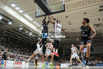 2023-10-15 - Dunk of Derek Cooke Jr of Dolomiti Trentino Energia during the match between Dolomiti Trentino Energia and Virtus Segafredo Bologna, regular season of A1 Italian Basketball Championship 2023/2024 at il T Quotidiano Arena on October 15, 2023, Trento, Italy. - DOLOMITI ENERGIA TRENTINO VS VIRTUS SEGAFREDO BOLOGNA - ITALIAN SERIE A - BASKETBALL