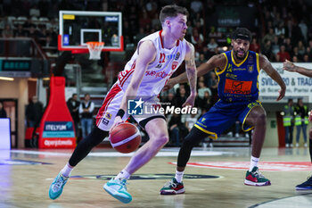 2023-11-19 - Sean Mcdermott #22 of Pallacanestro Varese OpenJobMetis (L) seen in action with Demetre Rivers #23 of Givova Scafati Basket (R) during LBA Lega Basket A 2023/24 Regular Season game between Pallacanestro Varese OpenJobMetis and Givova Scafati Basket at Itelyum Arena, Varese, Italy on November 19, 2023 - OPENJOBMETIS VARESE VS GIVOVA SCAFATI - ITALIAN SERIE A - BASKETBALL