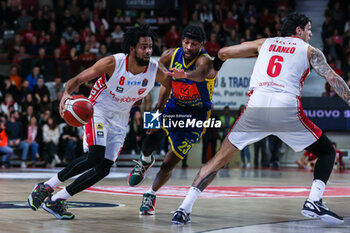 2023-11-19 - Andriu Tomas Woldetensae #8 of Pallacanestro Varese OpenJobMetis (L) seen in action with Demetre Rivers #23 of Givova Scafati Basket (C) and Scott Ulaneo #6 of Pallacanestro Varese OpenJobMetis (R) during LBA Lega Basket A 2023/24 Regular Season game between Pallacanestro Varese OpenJobMetis and Givova Scafati Basket at Itelyum Arena, Varese, Italy on November 19, 2023 - OPENJOBMETIS VARESE VS GIVOVA SCAFATI - ITALIAN SERIE A - BASKETBALL