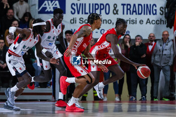 2023-12-29 - (R-L) Gabe Brown #44 of Pallacanestro Varese OpenJobMetis seen in action with Olivier Hanlan #21 of Pallacanestro Varese OpenJobMetis, Mouhamed Faye #11 of Unahotels Reggio Emilia and Briante Webwe #2 of Unahotels Reggio Emilia during LBA Lega Basket A 2023/24 Regular Season game between Pallacanestro Varese OpenJobMetis and Unahotels Reggio Emilia at Itelyum Arena, Varese, Italy on December 29, 2023 - OPENJOBMETIS VARESE VS UNAHOTELS REGGIO EMILIA - ITALIAN SERIE A - BASKETBALL