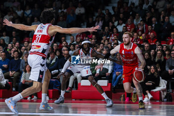 2023-12-29 - (R-L) Niccolo Mannion #4 of Pallacanestro Varese OpenJobMetis competes for the ball against Briante Webwe #2 of Unahotels Reggio Emilia and Michele Vitali #31 of Unahotels Reggio Emilia during LBA Lega Basket A 2023/24 Regular Season game between Pallacanestro Varese OpenJobMetis and Unahotels Reggio Emilia at Itelyum Arena, Varese, Italy on December 29, 2023 - OPENJOBMETIS VARESE VS UNAHOTELS REGGIO EMILIA - ITALIAN SERIE A - BASKETBALL
