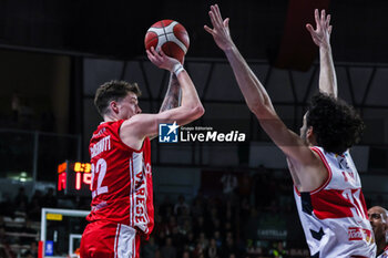 2023-12-29 - Sean Mcdermott #22 of Pallacanestro Varese OpenJobMetis (L) seen in action with Michele Vitali #31 of Unahotels Reggio Emilia (R) during LBA Lega Basket A 2023/24 Regular Season game between Pallacanestro Varese OpenJobMetis and Unahotels Reggio Emilia at Itelyum Arena, Varese, Italy on December 29, 2023 - OPENJOBMETIS VARESE VS UNAHOTELS REGGIO EMILIA - ITALIAN SERIE A - BASKETBALL