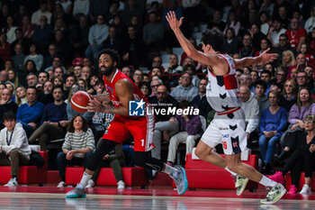 2023-12-29 - James Young #1 of Pallacanestro Varese OpenJobMetis (L) seen in action with Lorenzo Uglietti #16 of Unahotels Reggio Emilia (R) during LBA Lega Basket A 2023/24 Regular Season game between Pallacanestro Varese OpenJobMetis and Unahotels Reggio Emilia at Itelyum Arena, Varese, Italy on December 29, 2023 - OPENJOBMETIS VARESE VS UNAHOTELS REGGIO EMILIA - ITALIAN SERIE A - BASKETBALL