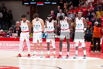 2023-11-12 - Unahotels Pallacanestro Reggiana during a moment of silence before the game against Estra Pistoia - UNAHOTELS REGGIO EMILIA VS ESTRA PISTOIA - ITALIAN SERIE A - BASKETBALL