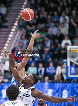 2023-12-17 - Paul Biligha ( Dolomiti Energia Trentino ) competes for the ball with Pauly Paulicap ( Nutribullet Treviso Basket ) - NUTRIBULLET TREVISO BASKET VS DOLOMITI ENERGIA TRENTINO - ITALIAN SERIE A - BASKETBALL