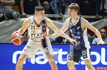 2023-01-22 - Matteo Fantinelli (Fortitudo Flats Service Bologna) thwarted by Enrico Micalich (UEB Gesteco Cividale) during the Italian basketball Lnp A2 series championship match Fortitudo Flats Service Bologna Vs. UEB Gesteco Cividale - Bologna, Italy, January 22, 2023 at Paladozza sport palace - Photo: Michele Nucci - FORTITUDO FLATS SERVICE BOLOGNA VS UEB CIVIDALE - ITALIAN SERIE A2 - BASKETBALL
