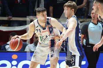2023-01-22 - Matteo Fantinelli (Fortitudo Flats Service Bologna) thwarted by Enrico Micalich (UEB Gesteco Cividale) during the Italian basketball Lnp A2 series championship match Fortitudo Flats Service Bologna Vs. UEB Gesteco Cividale - Bologna, Italy, January 22, 2023 at Paladozza sport palace - Photo: Michele Nucci - FORTITUDO FLATS SERVICE BOLOGNA VS UEB CIVIDALE - ITALIAN SERIE A2 - BASKETBALL