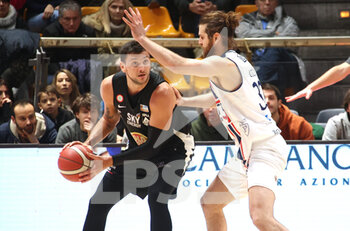 2023-01-29 - Alessandro Gentile (Apu old wild west Udine) thwarted by Valerio Cucci (Fortitudo Flats Service Bologna)  during the Italian basketball Lnp A2 series championship match Fortitudo Flats Service Bologna Vs. Apu Old Wild West Udine - Bologna, Italy, January 29, 2023 at Paladozza sport palace - Photo: Michele Nucci - FORTITUDO FLATS SERVICE BOLOGNA VS APU UDINE - ITALIAN SERIE A2 - BASKETBALL