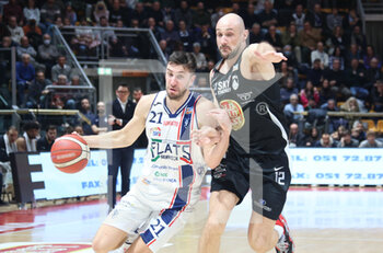2023-01-29 - Matteo Fantinelli (Fortitudo Flats Service Bologna) thwarted by Marco Cusin (Apu old wild west Udine) during the Italian basketball Lnp A2 series championship match Fortitudo Flats Service Bologna Vs. Apu Old Wild West Udine - Bologna, Italy, January 29, 2023 at Paladozza sport palace - Photo: Michele Nucci - FORTITUDO FLATS SERVICE BOLOGNA VS APU UDINE - ITALIAN SERIE A2 - BASKETBALL
