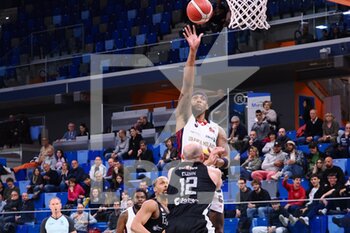 2023-04-08 - Kyndahl Hill (Urania Basket Milano) thwarted by Marco Cusin (Apu Old Wild West Udine)  - URANIA MILANO VS APU UDINE - ITALIAN SERIE A2 - BASKETBALL