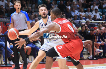 2023-10-01 - Matteo Fantinelli (Fortitudo Flats Services Bologna) thwarted by Austin Tilghman (Umana San Giobbe Chiusi) during the italian basketball Lbn A2 series championship match Fortitudo Flats services Bologna Vs. Umana San Giobbe Chiusi - Bologna, Italy, October 01, 2023 at Paladozza sport palace - Photo: Michele Nucci - FORTITUDO BOLOGNA VS SAN GIOBBE CHIUSI - ITALIAN SERIE A2 - BASKETBALL
