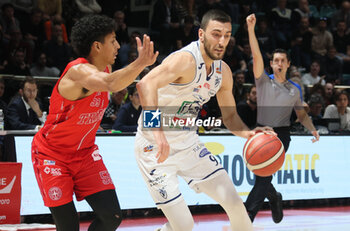 2023-12-23 - Riccardo Bolpin (Fortitudo Flats Services Bologna) (R) thwarted by Eli Jameson Brooks (Pallacanestro Trieste) during the italian basketball LBN A2 series championship match Fortitudo Flats Services Bologna Vs Pallacanestro Trieste - Bologna, Italy, December 23, 2023 at Paladozza sports hall - Photo: Michele Nucci - FORTITUDO BOLOGNA VS TRIESTE - ITALIAN SERIE A2 - BASKETBALL