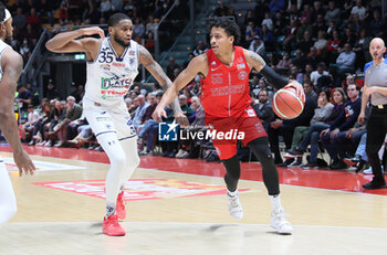 2023-12-23 - Eli Jameson Brooks (Pallacanestro Trieste) thwarted by Mark Ogden (Fortitudo Flats Services Bologna) during the italian basketball LBN A2 series championship match Fortitudo Flats Services Bologna Vs Pallacanestro Trieste - Bologna, Italy, December 23, 2023 at Paladozza sports hall - Photo: Michele Nucci - FORTITUDO BOLOGNA VS TRIESTE - ITALIAN SERIE A2 - BASKETBALL