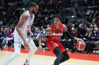 2023-12-23 - Eli Jameson Brooks (Pallacanestro Trieste) thwarted by Mark Ogden (Fortitudo Flats Services Bologna) during the italian basketball LBN A2 series championship match Fortitudo Flats Services Bologna Vs Pallacanestro Trieste - Bologna, Italy, December 23, 2023 at Paladozza sports hall - Photo: Michele Nucci - FORTITUDO BOLOGNA VS TRIESTE - ITALIAN SERIE A2 - BASKETBALL