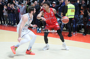 2023-12-23 - Eli Jameson Brooks (Pallacanestro Trieste) thwarted by Alessandro Panni (Fortitudo Flats Services Bologna) during the italian basketball LBN A2 series championship match Fortitudo Flats Services Bologna Vs Pallacanestro Trieste - Bologna, Italy, December 23, 2023 at Paladozza sports hall - Photo: Michele Nucci - FORTITUDO BOLOGNA VS TRIESTE - ITALIAN SERIE A2 - BASKETBALL
