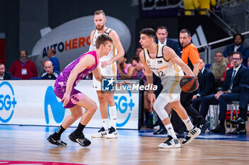 2023-11-26 - Carlos Alocen of Real Madrid seen in action with the ball during the ACB Spanish league match between Real Madrid and Morabanc Andorra at Wizink Center in Madrid, Spain. - REAL MADRID VS MORABANC ANDORRA - SPANISH LIGA ENDESA ACB - BASKETBALL