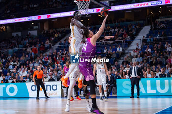 2023-11-26 - Marin Maric of Morabanc Andorra and Eli Ndiaye of Real Madrid seen in action with the ball during the ACB Spanish league match between Real Madrid and Morabanc Andorra at Wizink Center in Madrid, Spain. - REAL MADRID VS MORABANC ANDORRA - SPANISH LIGA ENDESA ACB - BASKETBALL