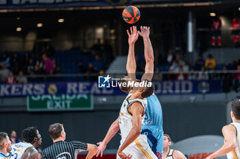 2023-12-03 - Edy Tavares of Real Madrid and Martynas Sajus of Rio Breogan seen in action during the Liga Endesa Acb 23/24 basketball match between Real Madrid vs Rio Breogan at Wizink center in Madrid, Spain. - REAL MADRID VS BREOGAN - SPANISH LIGA ENDESA ACB - BASKETBALL