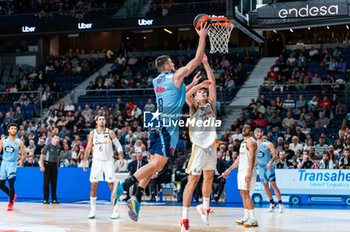 2023-12-03 - Stefan Momirov of Rio Breogan seen in action against Hugo Gonzalez of Real Madrid during the Liga Endesa Acb 23/24 basketball match between Real Madrid vs Rio Breogan at Wizink center in Madrid, Spain. - REAL MADRID VS BREOGAN - SPANISH LIGA ENDESA ACB - BASKETBALL