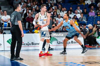 2023-12-03 - Mario Hezonja of Real Madrid seen in action against Justin Anderson of Rio Breogan during the Liga Endesa Acb 23/24 basketball match between Real Madrid vs Rio Breogan at Wizink center in Madrid, Spain. - REAL MADRID VS BREOGAN - SPANISH LIGA ENDESA ACB - BASKETBALL