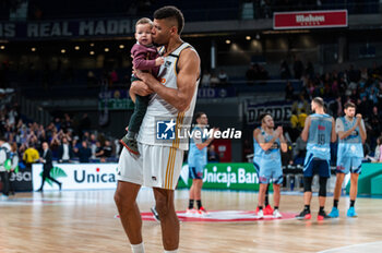 2023-12-03 - Edy Tavares of Real Madrid seen kissing his son at the end of the Liga Endesa Acb 23/24 basketball match between Real Madrid vs Rio Breogan at Wizink center in Madrid, Spain. - REAL MADRID VS BREOGAN - SPANISH LIGA ENDESA ACB - BASKETBALL