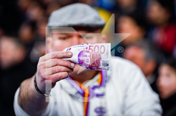 2023-03-02 - A Real Madrid fan protest against the corruption case involving Barcelona football team showing a banknote with the face of president Joan Laporta during the football match between
Real Madrid and Barcelona valid for the semifinal of the “Copa del Rey” Spanish cup celebrated in Madrid, Spain at Bernabeu stadium on Thursday 02 March 2023 - REAL MADRID VS BARCELONA - SPANISH CUP - SOCCER
