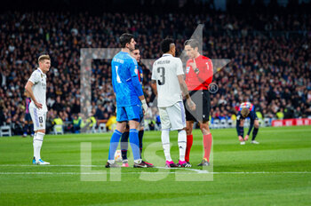 2023-03-02 - Ferran Torres (Barcelona), Thibaut Courtois (Real Madrid) and Éder Militão (Real Madrid) arguing with the referee about the Barcellona’s goal during the football match between
Real Madrid and Barcelona valid for the semifinal of the “Copa del Rey” Spanish cup celebrated in Madrid, Spain at Bernabeu stadium on Thursday 02 March 2023 - REAL MADRID VS BARCELONA - SPANISH CUP - SOCCER