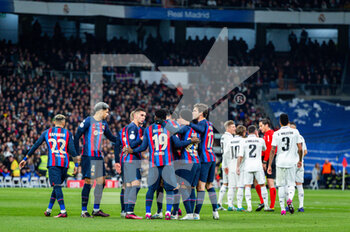 2023-03-02 - Barcellona’s team celebrate the Franck Kessie (Barcelona) goal meanwhile Real Madrid team protesting with the referee during the football match between
Real Madrid and Barcelona valid for the semifinal of the “Copa del Rey” Spanish cup celebrated in Madrid, Spain at Bernabeu stadium on Thursday 02 March 2023 - REAL MADRID VS BARCELONA - SPANISH CUP - SOCCER