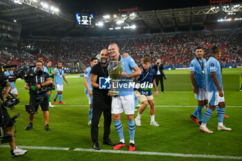 16/08/2023 - Happiness of Manchester City’s Erling Haaland and Head Coach Pep Guardiola after win the UEFA Super Cup 2023 final soccer match between Manchester City F.C. vs. Sevilla F.C. at the Stadio Georgios Karaiskakis-Piraeus in Athens, Greece, 16th of August 2023 - EUROPEAN SUPER CUP MANCHESTER CITY VS SEVILLE - SUPERCOPPA EUROPEA - CALCIO