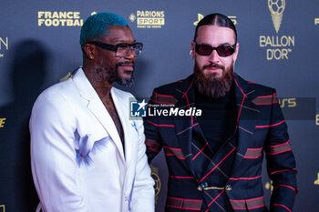 2023-10-30 - Djibril Cisse and French singer SCH during the red carpet ceremony of the Ballon d'Or (Golden Ball) France Football 2023 on October 30, 2023 at Theatre du Chatelet in Paris, France - FOOTBALL - BALLON D'OR 2023 - RED CARPET CEREMONY - OTHER - SOCCER