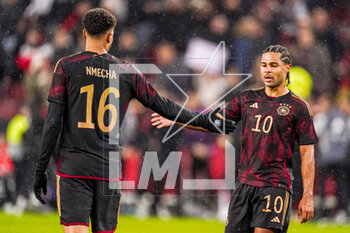 2023-03-28 - Serge Gnabry, Felix Nmecha of Germany after the International Friendly football match between Germany and Belgium on March 28, 2023 at RheinEnergieStadion in Cologne, Germany - FOOTBALL - FRIENDLY GAME - GERMANY V BELGIUM - FRIENDLY MATCH - SOCCER