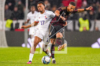 2023-03-28 - Lois Openda of Belgium, Thilo Kehrer of Germany during the International Friendly football match between Germany and Belgium on March 28, 2023 at RheinEnergieStadion in Cologne, Germany - FOOTBALL - FRIENDLY GAME - GERMANY V BELGIUM - FRIENDLY MATCH - SOCCER