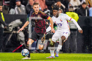2023-03-28 - Joshua Kimmich of Germany and Johan Bakayoko of Belgium during the International Friendly football match between Germany and Belgium on March 28, 2023 at RheinEnergieStadion in Cologne, Germany - FOOTBALL - FRIENDLY GAME - GERMANY V BELGIUM - FRIENDLY MATCH - SOCCER