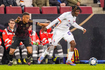 2023-03-28 - Johan Bakayoko of Belgium and Thilo Kehrer of Germany during the International Friendly football match between Germany and Belgium on March 28, 2023 at RheinEnergieStadion in Cologne, Germany - FOOTBALL - FRIENDLY GAME - GERMANY V BELGIUM - FRIENDLY MATCH - SOCCER