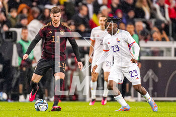 2023-03-28 - Timo Werner of Germany and Johan Bakayoko of Belgium during the International Friendly football match between Germany and Belgium on March 28, 2023 at RheinEnergieStadion in Cologne, Germany - FOOTBALL - FRIENDLY GAME - GERMANY V BELGIUM - FRIENDLY MATCH - SOCCER
