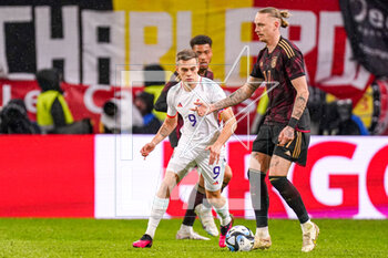 2023-03-28 - Marius Wolf of Germany, Leandro Trossard of Belgium during the International Friendly football match between Germany and Belgium on March 28, 2023 at RheinEnergieStadion in Cologne, Germany - FOOTBALL - FRIENDLY GAME - GERMANY V BELGIUM - FRIENDLY MATCH - SOCCER