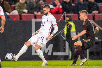 2023-03-28 - Yannick Carrasco of Belgium and Joshua Kimmich of Germany during the International Friendly football match between Germany and Belgium on March 28, 2023 at RheinEnergieStadion in Cologne, Germany - FOOTBALL - FRIENDLY GAME - GERMANY V BELGIUM - FRIENDLY MATCH - SOCCER