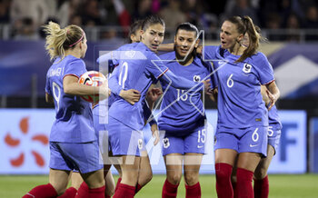 2023-04-07 - Eugenie Le Sommer, Clara Mateo, Kenza Dali, Sandie Toletti of France celebrate a goal during the Women's Friendly football match between France and Colombia on April 7, 2023 at Stade Gabriel-Montpied in Clermont-Ferrand, France - FOOTBALL - WOMEN'S FRIENDLY GAME - FRANCE V COLOMBIA - FRIENDLY MATCH - SOCCER