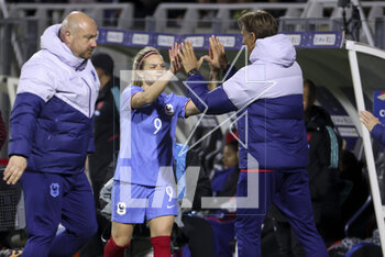 2023-04-07 - Eugenie Le Sommer of France celebrates her goal with coach of France Herve Renard when she's replaced during the Women's Friendly football match between France and Colombia on April 7, 2023 at Stade Gabriel-Montpied in Clermont-Ferrand, France - FOOTBALL - WOMEN'S FRIENDLY GAME - FRANCE V COLOMBIA - FRIENDLY MATCH - SOCCER
