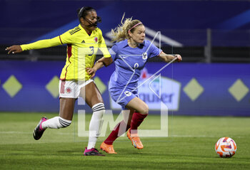 2023-04-07 - Eugenie Le Sommer of France, Arias Daniela of Colombia (left) during the Women's Friendly football match between France and Colombia on April 7, 2023 at Stade Gabriel-Montpied in Clermont-Ferrand, France - FOOTBALL - WOMEN'S FRIENDLY GAME - FRANCE V COLOMBIA - FRIENDLY MATCH - SOCCER